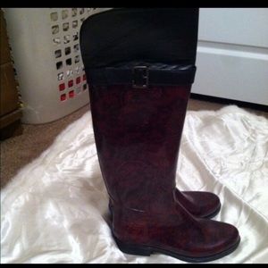 Knee high rain boots